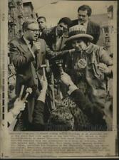 1970 Press Photo Governor Rockefeller on top of abandoned car answers questions picture