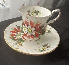Royalty NOEL Fine Bone China England Teacup and Saucer EUC Christmas Poinsettia picture