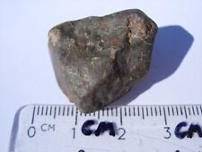 11.8 grams NWA xxxx unclassified individual Meteorite as found in Africa + a COA picture