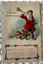J.P. 1917 Merry Christmas Santa Blowing Horn Postcard embossed picture
