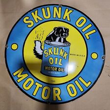 SKUNK MOTOR OIL PORCELAIN ENAMEL SIGN 30 INCHES ROUND picture