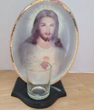 The heart of Christ, decorative plate, stand and candle  picture