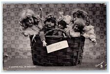c1910's A Hamper Full Of Mischief Dolls In Basket Silverette Tuck's Postcard picture