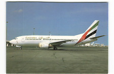 Postcard Airline EMIRATES AIRLINES Boeing 737-340 AP-BCD at Dubai Airport AUC1. picture