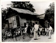 LG70 1957 Original United Press Photo MALAYSIAN LOCALS RELOCATE HOME BY HAND picture