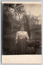 RPPC Larger  Woman Poses For Photo In Yard Postcard P30 picture