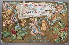 antique 1910 postcard embossed A Merry Christmas cupid bells holly ribbon gilt picture