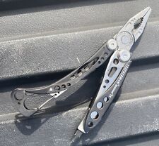 Leatherman Skeletool CX Minimalist Multi-Tool Pliers Pocket Knife Carabiner picture