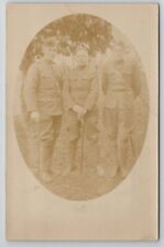 RPPC Three WW1 Soldiers with Canes Posing for Photo Postcard J30 picture