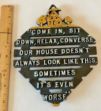 Vintage Cast Iron Trivet with Humorous saying Footed. picture
