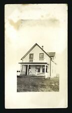 Kindersley Saskatchewan a house with a front porch Historic Old Photo picture