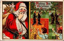 Red Robe Santa Claus ~Fireplace~Toys~Children~Antique Christmas Postcard~g427 picture