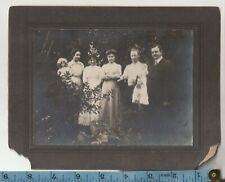 Antique C1910-20 cabinet photo Odd group shot man and woman holding dolls creepy picture