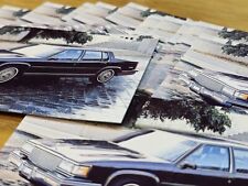 40 1987 Cadillac Sedan DeVille Postcard Excellent Original 87 NOS LOT picture