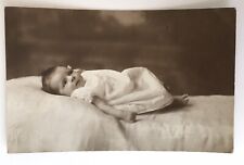 Vintage RPPC of Newborn Baby with Lots of Dark Hair Laying on Blanket picture