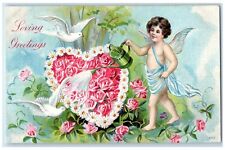 c1910's Loving Greetings Cupid Angel Heart Flowers Embossed Antique Postcard picture