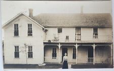 RPPC 1911 New Lisbon, Wisconsin WI Lady Standing In Front Of Farm Home Postcard picture