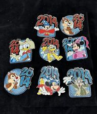 Disney ~ 2014 Dated Year Booster Pin ~ Set of 8 Pins ~ Mickey , Donald Duck picture
