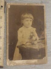 Antique Victorian Era Photograph Of Girl Holding A Bouquet Of Flowers  picture