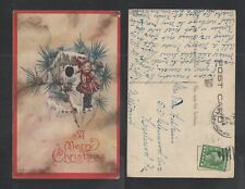 1914 A MERRY CHRISTMAS { DOLL + BIRDHOUSE + PINE BRANCHES } POSTCARD picture