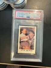 1962 Dutch Gum Card CA #139 JOHN WAYNE Holding Young Girl PSA 9 MINT picture