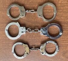 3 sets of real, genuine, authentic handcuffs, of unknown origin, unknown history picture