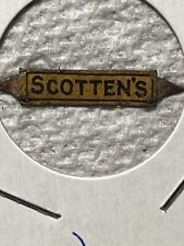 Scotten’s  (yellow) vintage tin tobacco tag picture