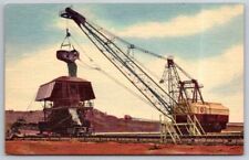Minnesota's Mesabi Iron Range At Hibbing Earth Moving Machine Postcard  picture