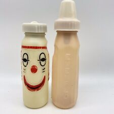 Vintage Dolly Bottle Clown Face and Evenflow Real Baby Bottle Lot of 2 picture