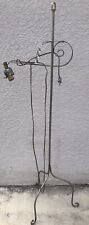 VINTAGE 3 FOOTED METAL/IRON WROUGHT FLOOR LAMP WITH LEAF DESIGN. picture