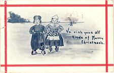 Cartoon Merry Christmas Dutch Boy Girl Ice Skating Divided Postcard Posted 1911 picture