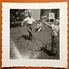 VINTAGE PHOTO brothers playing with strange toys, great shadows, Original 1950s picture
