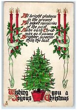 1912 Christmas Tree Holly Candles Ribbon Embossed Tuck's Antique Postcard picture