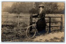 c1910's Woman Bicycle Fence England United Kingdom UK RPPC Photo Postcard picture