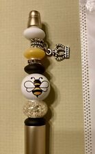 “Queen” Bee handmade pen crafted with dangle charms of a crown and gem picture