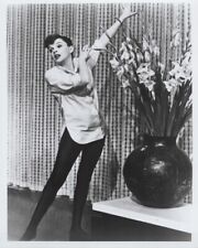 A Star is Born 1954 8x10 inch photo Judy Garland full body pose next to flowers picture