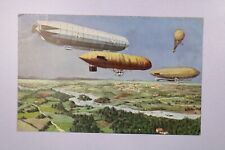 Vintage PPC Zeppelins Over A River - L38442 picture