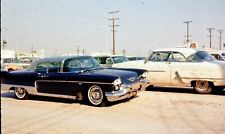 1966 35mm slide. 1958 Cadillac Eldorado Brougham in a dusty parking lot. picture