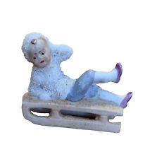 Vintage German Snow Baby Leaning Back On Sled Porcelain Bisque #8445 picture