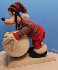 Vintage Santa’s Disney Animated Goofy Rolling Snowball, Mickey Unlimited. picture