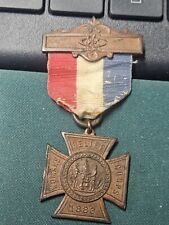 VINTAGE 1883 WOMEN'S RELIEF CORPS MEDAL W/ RIBBON PATENTED MAY 4 & SEPT 28 1886 picture