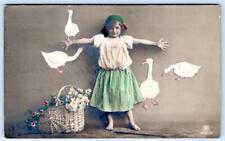 1915 RPPC ITALY PEASANT GIRL FLOWER BASKET GEESE ON WALL STRIPE SKIRT POSTCARD picture