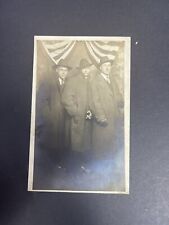 RPPC Three Gentleman In Trench Coats Standing In Front American Flag  picture