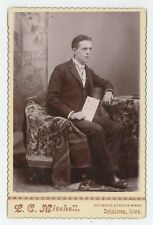 Antique c1880s Cabinet Card Handsome Young Man Holding Pamphlet Oskaloosa, IA picture