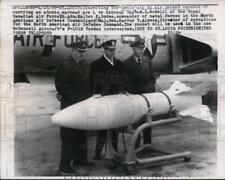 1958 Press Photo Inspecting Genie Air to Air Rocket Capable of Carrying Warhead picture