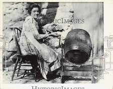 Press Photo Woman with butter churn - afa67008 picture