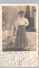 WOMAN OUTSIDE BUILDING lancaster pa real photo postcard rppc pennsyvlania picture