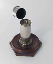 An Antique Oil Lighter With Wood Stand picture