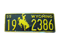 NOS 1955 Wyoming license plate in unissued shiny condition with Rodeo Cowboy picture