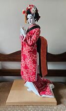 Vintage Oriental Geisha Doll Japan Wearing Red Kimono on Wooden Stand 26.5